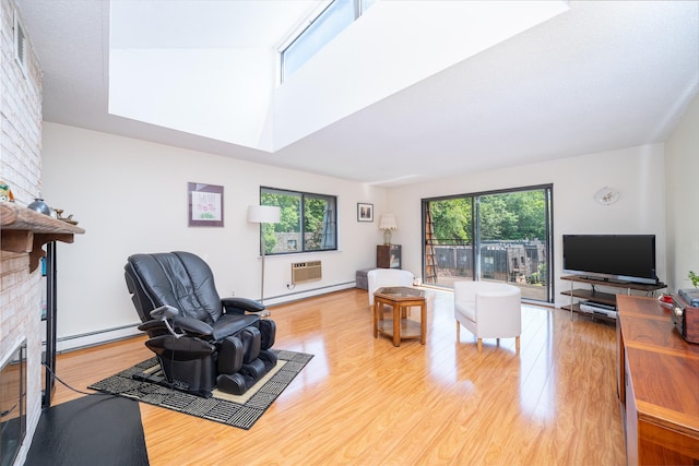 7-05 Briarcliff Dr S, Ossining, NY 10562 - living room featuring a fireplace, light wood-style floors, baseboard heating, and a skylight