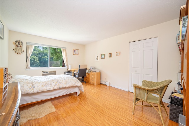 7-05 Briarcliff Dr S, Ossining, NY 10562 - bedroom featuring light wood-style floors, baseboard heating, and a desk