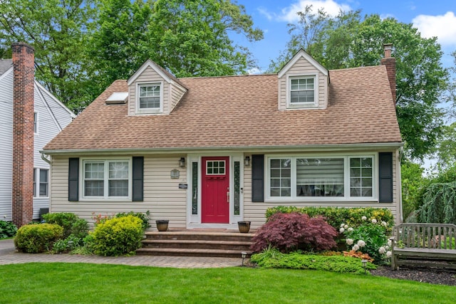183 Iceland Dr, South Huntington, NY 11746 - cape cod-style house featuring a shingled roof, a front yard, and a chimney