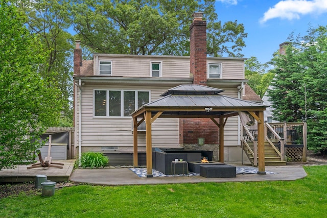183 Iceland Dr, South Huntington, NY 11746 - rear view of house with a deck, a gazebo, a chimney, and an outdoor living space with a fire pit