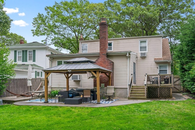 183 Iceland Dr, South Huntington, NY 11746 - back of property featuring a gazebo, a patio area, a wooden deck, and a chimney