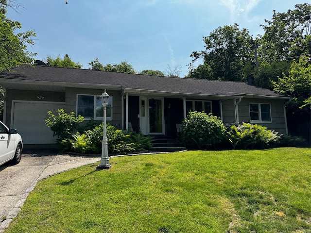2 Paulding St, Huntington, NY 11743 - ranch-style home with a garage, a front lawn, and driveway