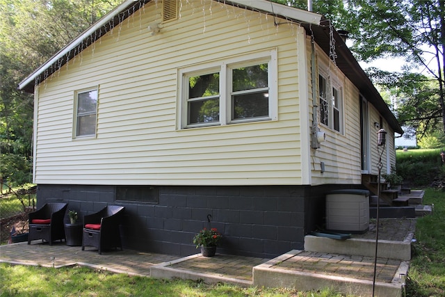 104 Maple Ave, Bethel, NY 12749 - view of home's exterior featuring a patio area