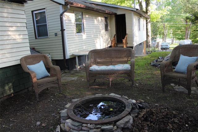 104 Maple Ave, Bethel, NY 12749 - view of patio featuring a fire pit