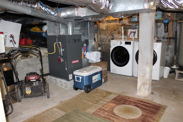 104 Maple Ave, Bethel, NY 12749 - unfinished basement featuring washing machine and dryer and heating unit