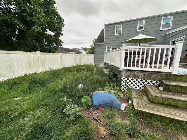 417 S Ocean Ave, Patchogue, NY 11772 - rear view of property with a wooden deck