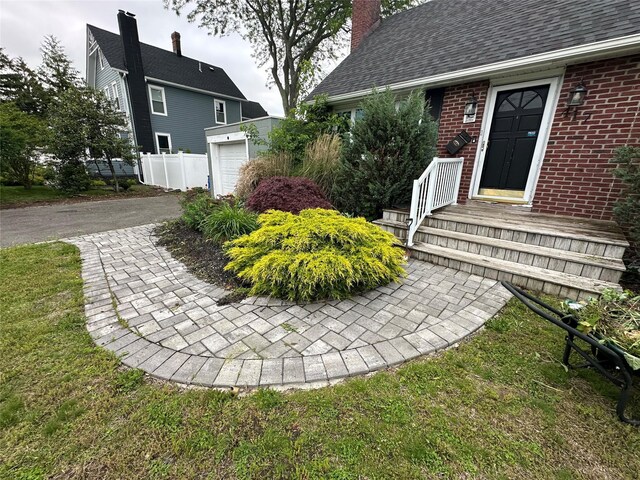 417 S Ocean Ave, Patchogue, NY 11772 - view of yard with a garage and driveway