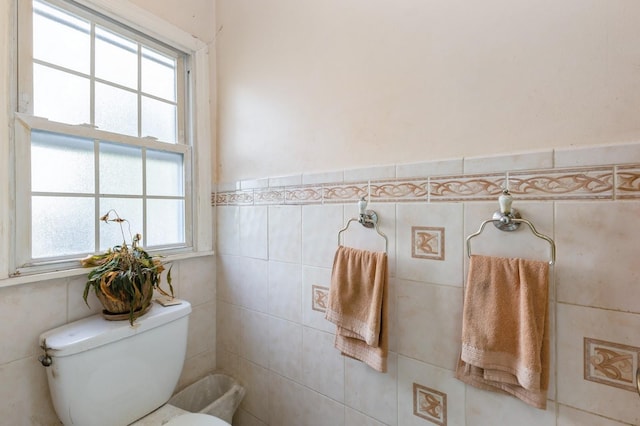 16249 13th Ave, Beechhurst, NY 11357 - bathroom with toilet, tile walls, and a wainscoted wall