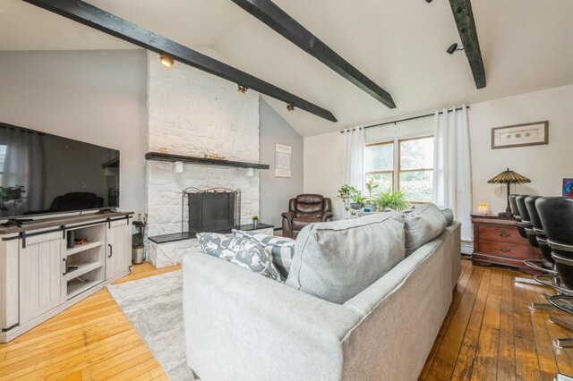 405 Waukena Ave, Oceanside, NY 11572 - living area featuring hardwood / wood-style flooring and a fireplace