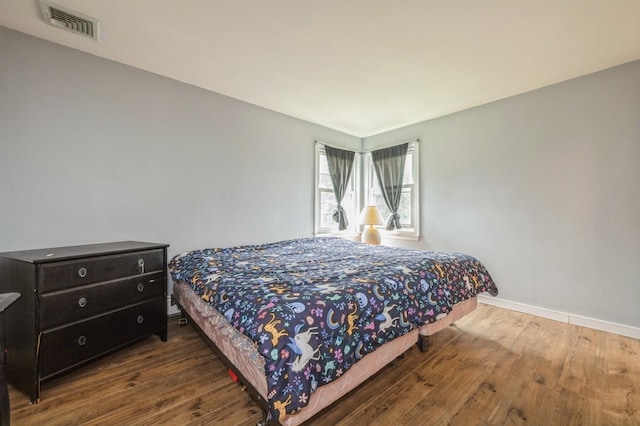 405 Waukena Ave, Oceanside, NY 11572 - bedroom featuring wood finished floors