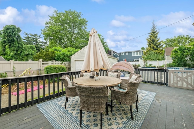 405 Waukena Ave, Oceanside, NY 11572 - deck featuring a fenced backyard and outdoor dining space