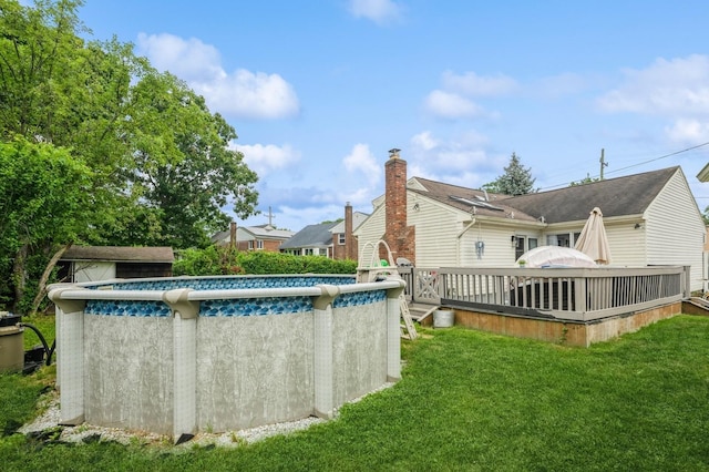 405 Waukena Ave, Oceanside, NY 11572 - outdoor pool featuring a deck and a yard