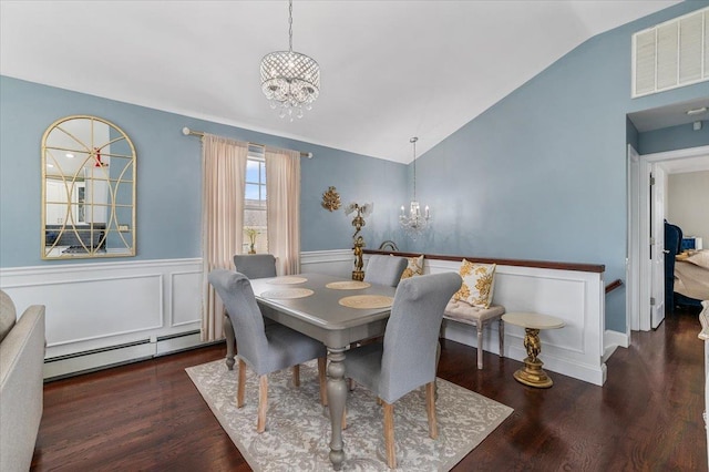 845 Atlantic St, Lindenhurst, NY 11757 - dining space featuring a chandelier, baseboard heating, vaulted ceiling, wainscoting, and wood finished floors