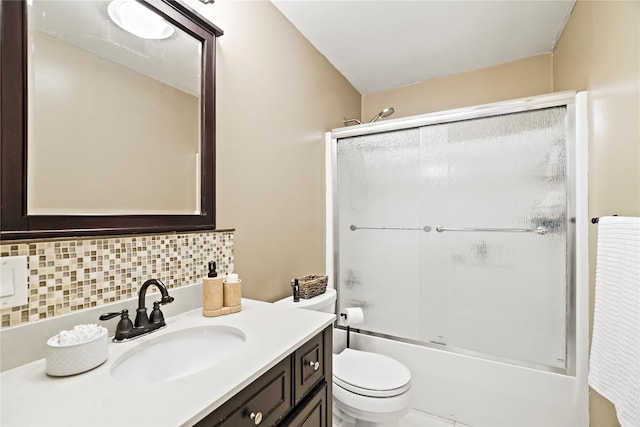 3856 Marcy St, Mohegan Lake, NY 10547 - bathroom featuring decorative backsplash, vanity, and shower / bath combination with glass door