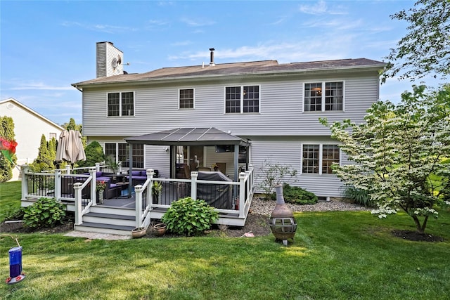 3856 Marcy St, Mohegan Lake, NY 10547 - back of property with a gazebo, a lawn, a deck, and a chimney