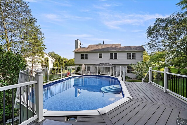 3856 Marcy St, Mohegan Lake, NY 10547 - view of swimming pool with a deck