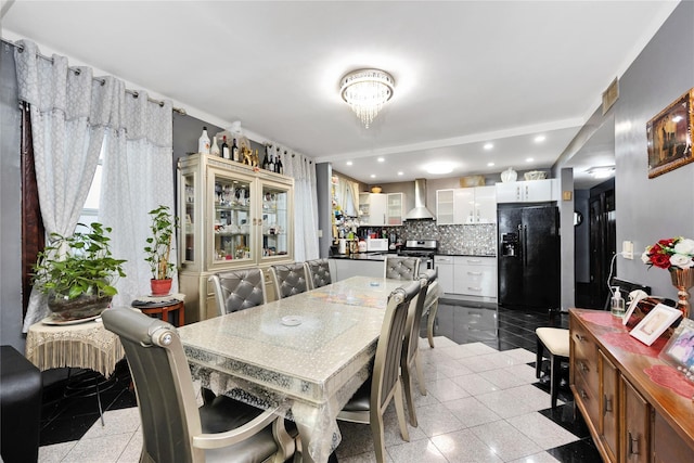 6018 Bleecker St, Ridgewood, NY 11385 - dining room featuring recessed lighting, granite floors, and a chandelier