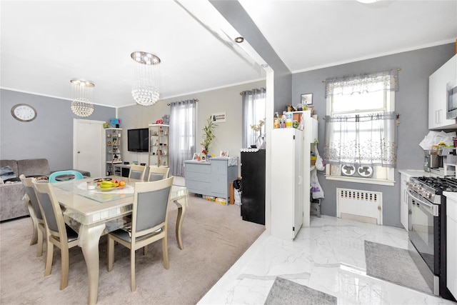6018 Bleecker St, Ridgewood, NY 11385 - dining area featuring radiator, crown molding, a chandelier, and light marble finish floors
