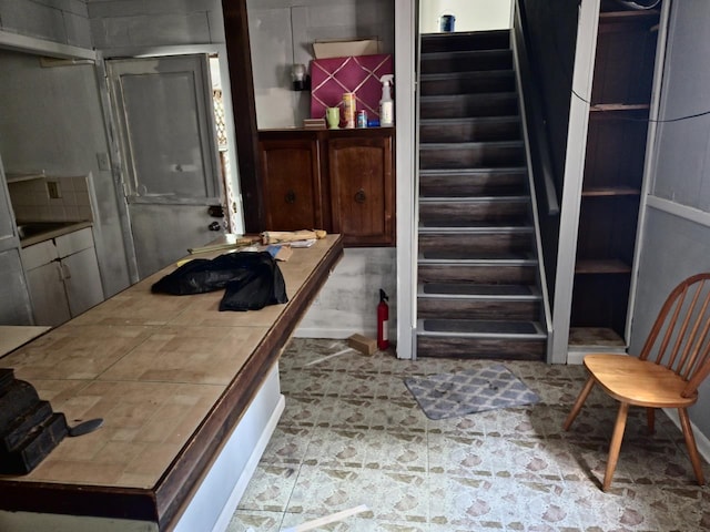 24 E Oakdale St, Bay Shore, NY 11706 - basement with stone flooring and stairs