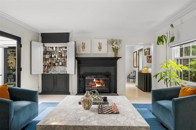 71 Baraud Rd S, Scarsdale, NY 10583 - living area featuring crown molding, wood finished floors, a fireplace with flush hearth, and bar area