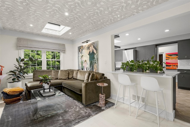 71 Baraud Rd S, Scarsdale, NY 10583 - living area with a skylight and recessed lighting