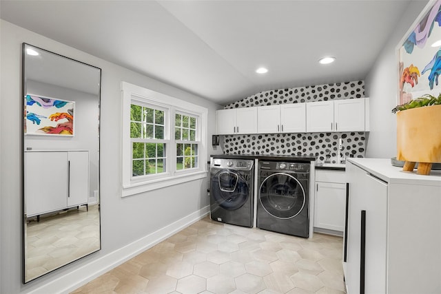 71 Baraud Rd S, Scarsdale, NY 10583 - laundry area with independent washer and dryer, cabinet space, recessed lighting, and light tile patterned flooring