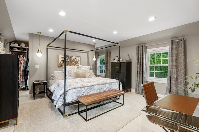 71 Baraud Rd S, Scarsdale, NY 10583 - bedroom featuring multiple windows, recessed lighting, and a walk in closet