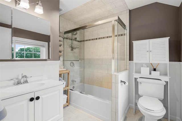 71 Baraud Rd S, Scarsdale, NY 10583 - full bath featuring bath / shower combo with glass door, vanity, and tile patterned flooring
