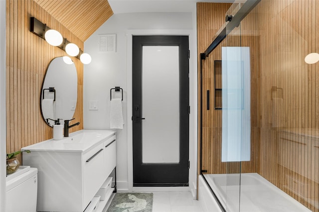 71 Baraud Rd S, Scarsdale, NY 10583 - bathroom featuring vanity, vaulted ceiling, and bath / shower combo with glass door