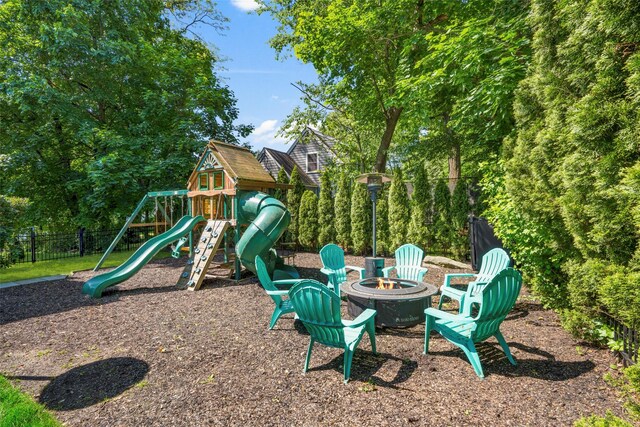71 Baraud Rd S, Scarsdale, NY 10583 - view of play area with an outdoor fire pit