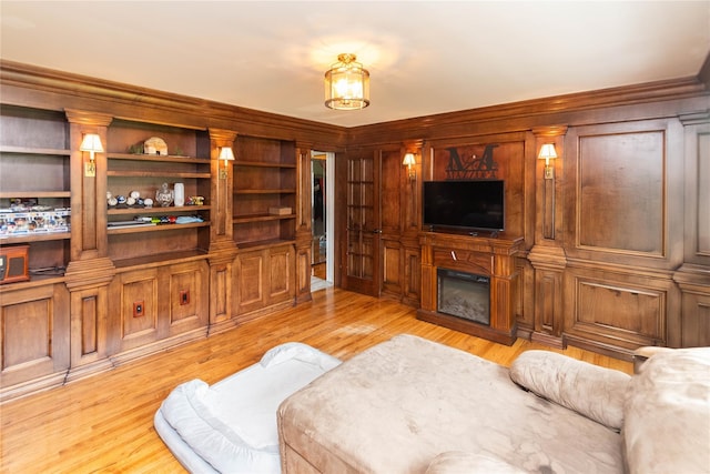 2 Sheafe Cir, Rock Tavern, NY 12575 - living area featuring light wood-type flooring and a glass covered fireplace