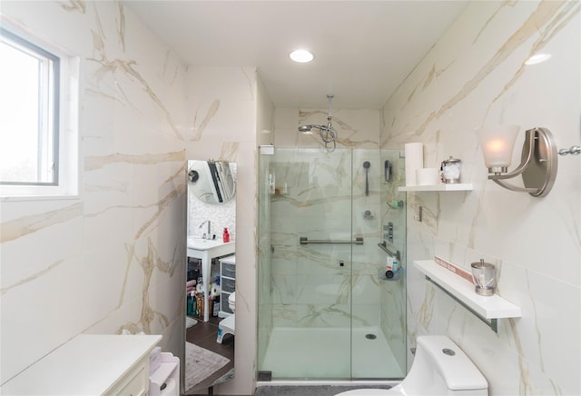 2 Sheafe Cir, Rock Tavern, NY 12575 - full bathroom featuring tile walls, a marble finish shower, toilet, and a sink