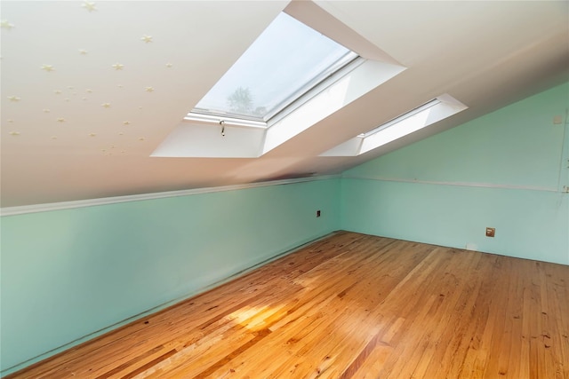 2 Sheafe Cir, Rock Tavern, NY 12575 - bonus room with a skylight, hardwood / wood-style floors, and vaulted ceiling