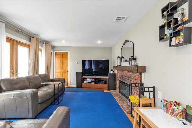 8 Trumpet Ln, Levittown, NY 11756 - living room with a brick fireplace and recessed lighting