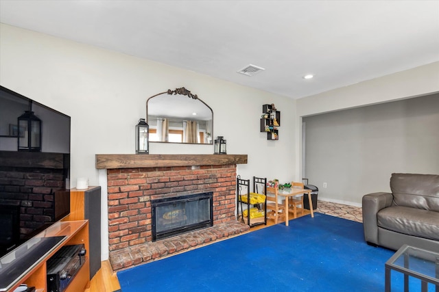 8 Trumpet Ln, Levittown, NY 11756 - living room featuring a fireplace, recessed lighting, and baseboards