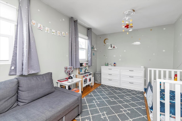 8 Trumpet Ln, Levittown, NY 11756 - bedroom with wood finished floors