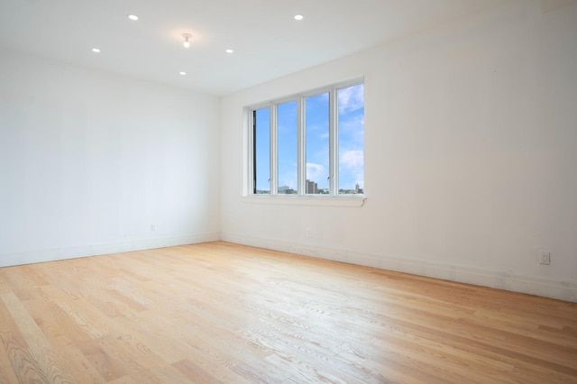 859 Myrtle Ave Apt 8G, Brooklyn, NY 11206 - empty room featuring wood finished floors and recessed lighting