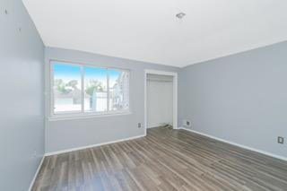 293 Wingham St, Staten Island, NY 10303 - empty room with baseboards and wood finished floors