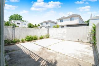 293 Wingham St, Staten Island, NY 10303 - fenced backyard featuring a patio area