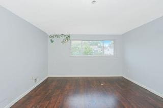 293 Wingham St, Staten Island, NY 10303 - unfurnished room with wood finished floors and baseboards