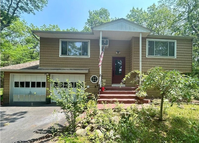 102 Carman Rd, Dix Hills, NY 11746 - raised ranch with driveway and a garage