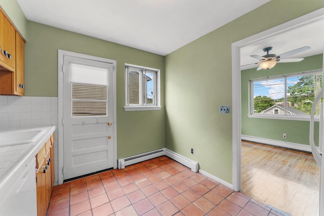102 Maple St, Croton-On-Hudson, NY 10520 - kitchen with a baseboard heating unit, tile counters, a ceiling fan, light tile patterned floors, and dishwasher