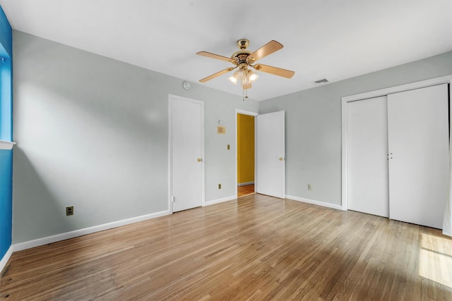 102 Maple St, Croton-On-Hudson, NY 10520 - unfurnished bedroom featuring wood finished floors, ceiling fan, and a closet