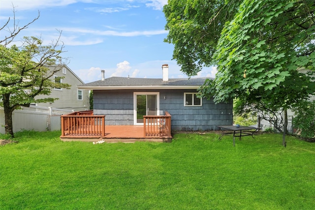 102 Maple St, Croton-On-Hudson, NY 10520 - rear view of house with a deck, a chimney, and roof with shingles