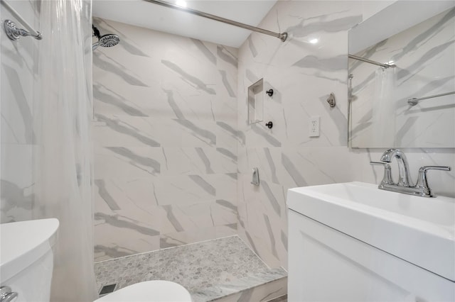 239-53 66th Ave, Little Neck, NY 11362 - bathroom with toilet, a stall shower, vanity, and tile walls