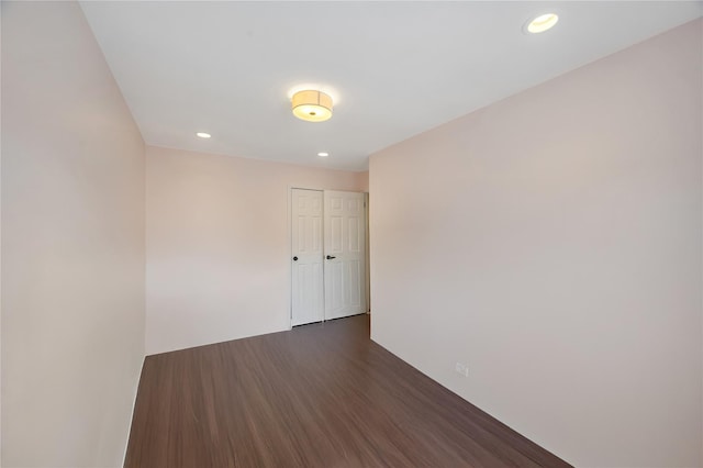 239-53 66th Ave, Little Neck, NY 11362 - empty room featuring dark wood-type flooring and recessed lighting