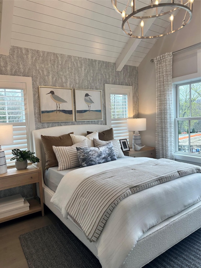 18 Marker Rdg Unit 9, Irvington, NY 10533 - bedroom with a chandelier, multiple windows, and wood finished floors
