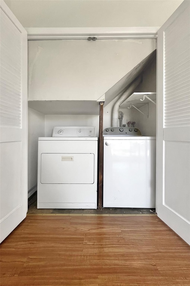 4 Red Barn Ln, Middletown, NY 10940 - laundry room with washing machine and clothes dryer and wood finished floors