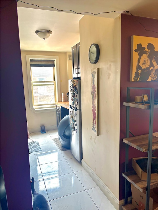 61 Bronx River Rd Unit 8E, Yonkers, NY 10704 - corridor featuring baseboards and light marble finish flooring