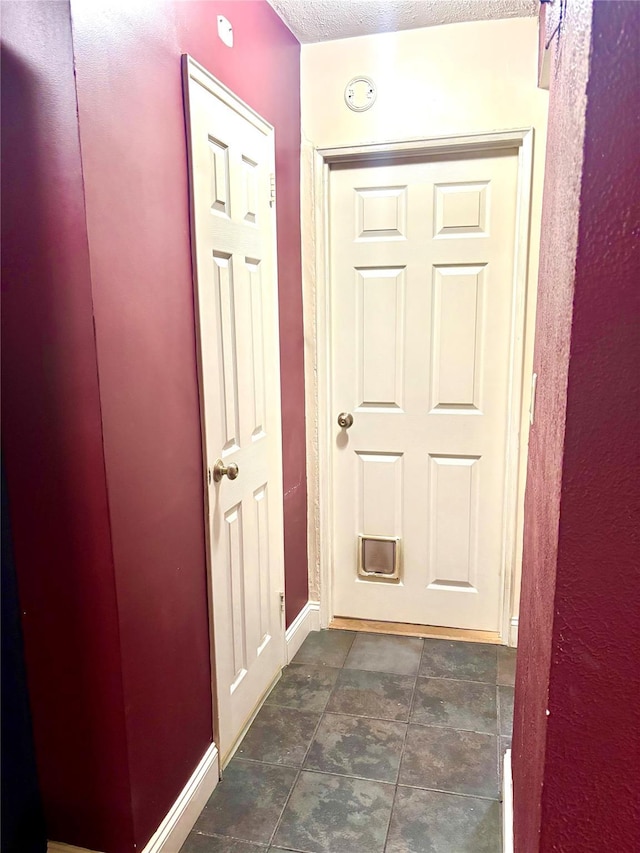 61 Bronx River Rd Unit 8E, Yonkers, NY 10704 - hall featuring baseboards